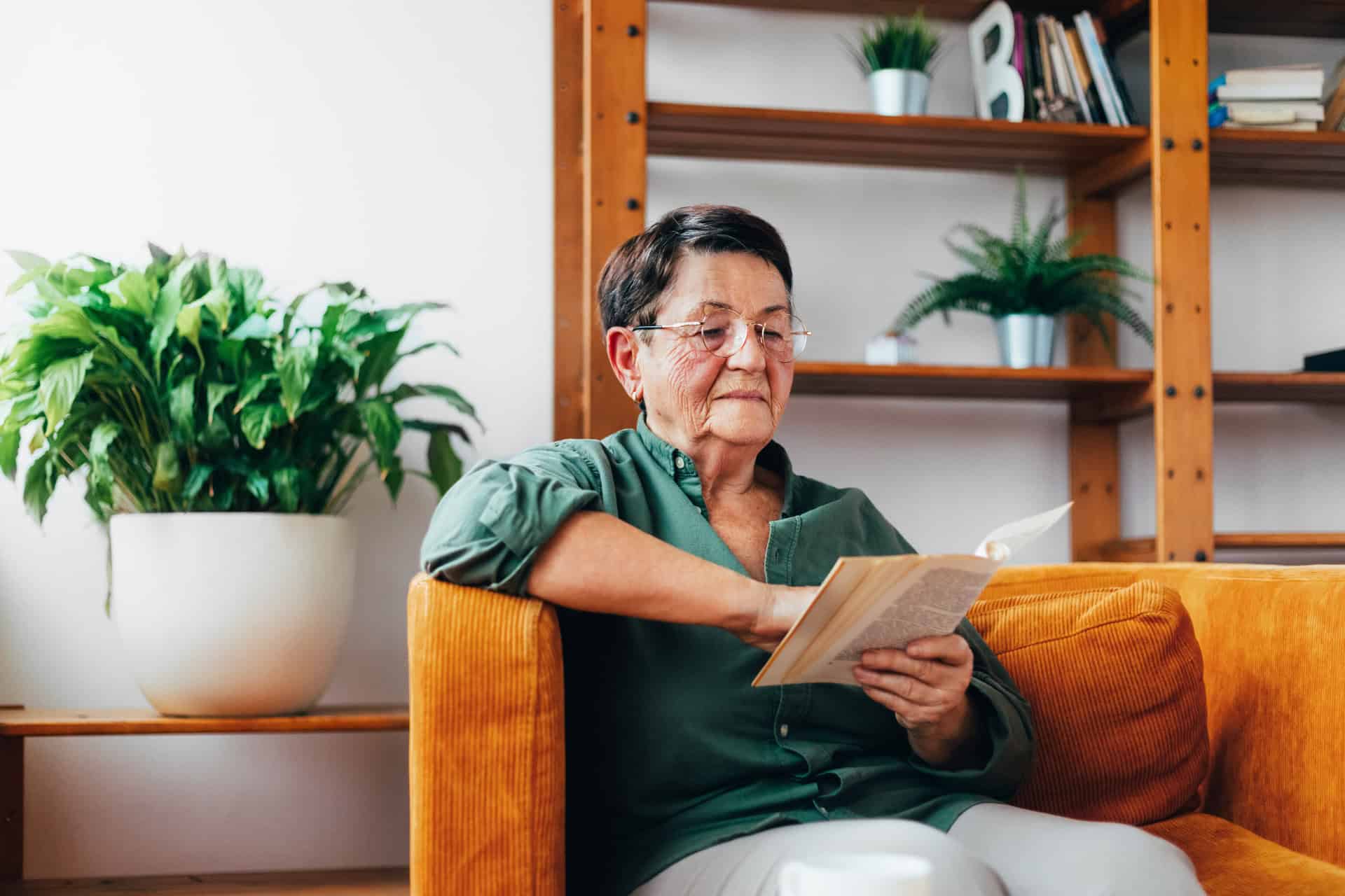 elderly senior woman reading