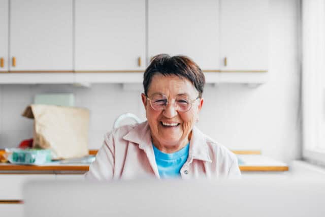 elderly woman smiling kitchen